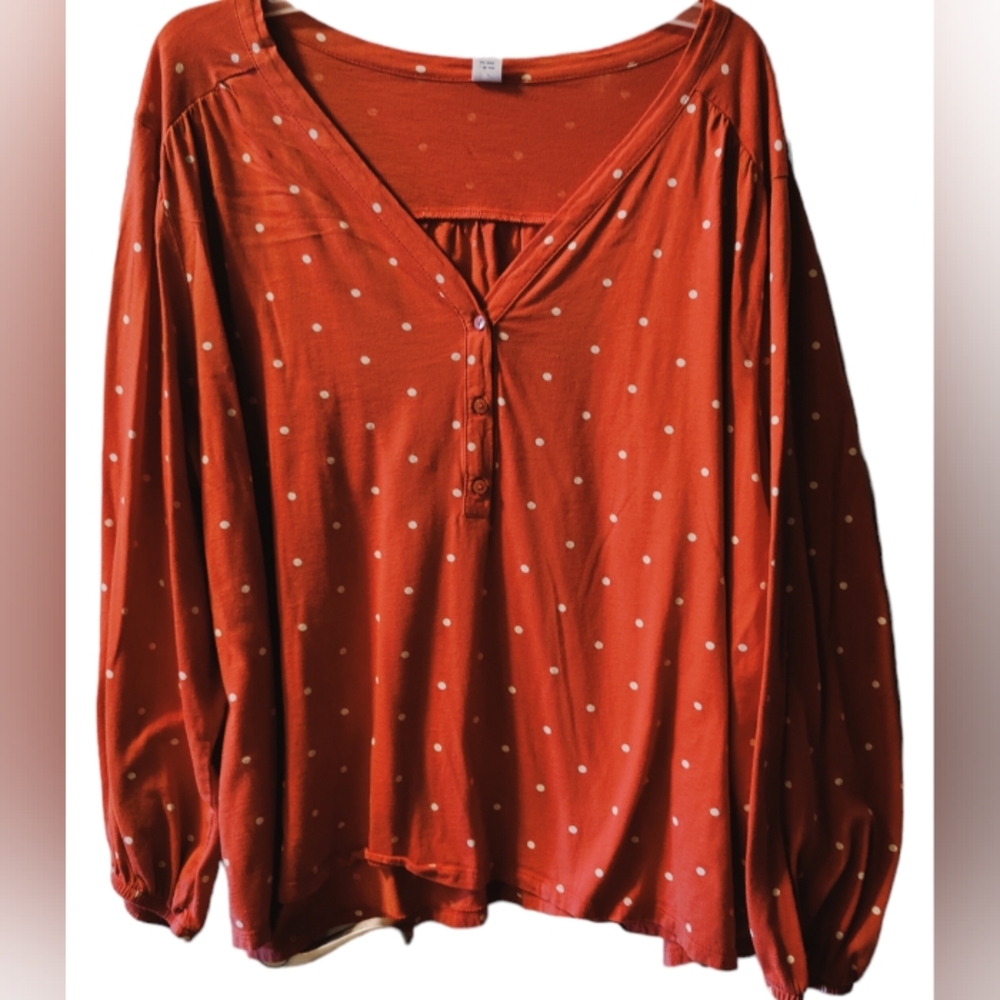 Orange top with white dots